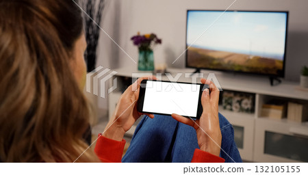 Woman hand Holding Horinzontal white Screen for Copy Space Woman hand Holding Horinzontal white Screen for Copy Space 132105155
