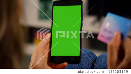 Woman Customer hands holding Credit Card and Smartphone Woman Customer hands holding Credit Card and Smartphone 132105159
