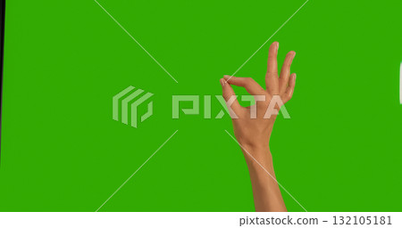 Gestures female Hand OKAY OK Everything is Good on a Green Background Gestures female Hand OKAY OK Everything is Good on a Green Background 132105181