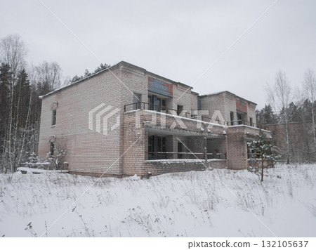 snowcovered vacant areas suggest opportunity for redevelopment or renewal, snowcovered vacant balcony and courtyard indicate potential for future redevelopment and renewal possibilities 132105637