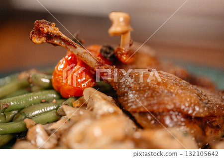 Appetizing Duck Meal Fried Tomato Decorated 132105642
