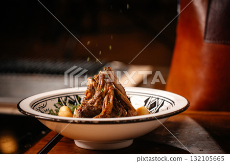 Cooked Lamb Ribs Seasoned with Parsley. Cooked Lamb Ribs Seasoned with Parsley. 132105665