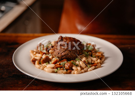 Professional chef cooking in kitchen. 132105668