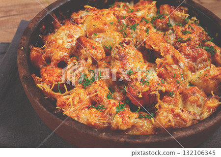 Baked fish with potatoes and cheese, gratin, homemade, no people, 132106345
