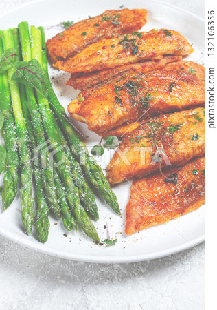 fried fish fillet, tilapia with asparagus, homemade, no people, 132106356