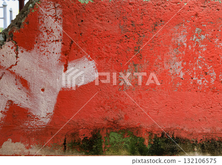 Old orange color paint on old concrete wall texture. 132106575