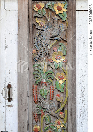 Close up old Carving wooden door with color sculptural, wood carving Door. Close up old Carving wooden door with color sculptural, wood carving Door. 132106648