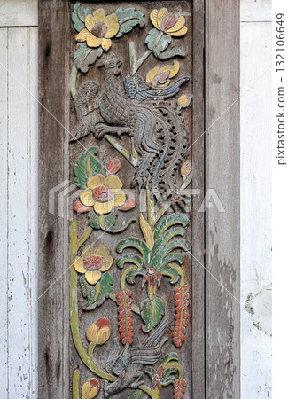 Close up old Carving wooden door with color sculptural, wood carving Door. Close up old Carving wooden door with color sculptural, wood carving Door. 132106649
