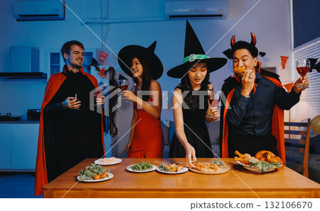 Joyful office Halloween party with coworkers in costumes, celebrating with drinks and laughter, fostering teamwork and festive spirit Joyful office Halloween party with coworkers in costumes, celebrating with drinks and laughter, fostering teamwork and festive spirit 132106670