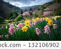 Vibrant Field of Yellow Daffodils and Pink Hyacinths in a Botanical Garden 132106902