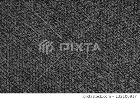 Close up, macro texture of upholstery black woven fabric with detailed textile pattern 132106917
