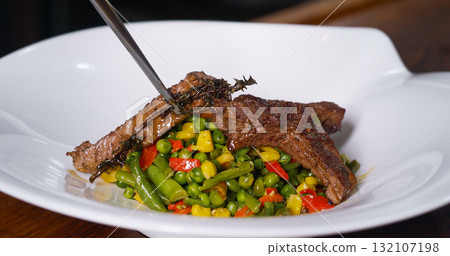 Beef Meat and Vegetables Plate. Fried Corn Green Beans. Beef Meat and Vegetables Plate. Fried Corn Green Beans. 132107198