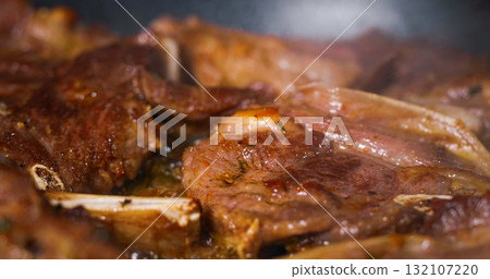Close Up Tasty Meat Frying. Appetizing Lamb Dish. Macro about Food. Close Up Tasty Meat Frying. Appetizing Lamb Dish. Macro about Food. 132107220