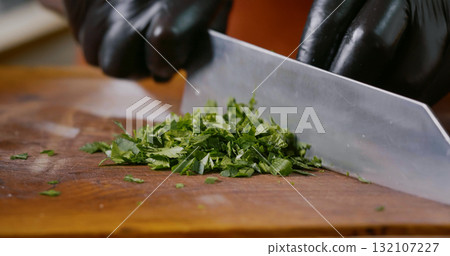 Close up Parsley Chopping on a wood chipper 132107227