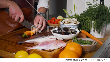 Process of mediterranean dish preparation. Fresh Mollusks Fish Shell Shrimp Process of mediterranean dish preparation. Fresh Mollusks Fish Shell Shrimp 132107243