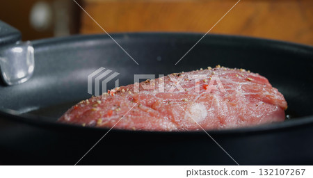 Pork Meat Seasoned is Frying in Hot Pan, Cooking. Pork Meat Seasoned is Frying in Hot Pan, Cooking. 132107267