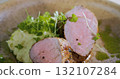 Pork Tenderloin Prepared for Serving - Art Food, Gourmet Meal Close Up. 132107284