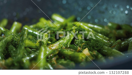 Cooked Green Beans Sprinkled with Dill . Close up Vegetarian Meals with Beans. Cooked Green Beans Sprinkled with Dill . Close up Vegetarian Meals with Beans. 132107288