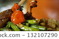 Appetizing Duck Meal Fried Tomato Decorated Close Up Details of Cooking. 132107290