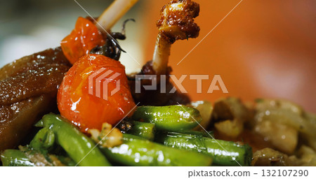 Appetizing Duck Meal Fried Tomato Decorated Close Up Details of Cooking. Appetizing Duck Meal Fried Tomato Decorated Close Up Details of Cooking. 132107290