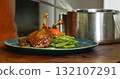 Appetizing Duck Meal Fried Tomato Decorated Close Up Details of Cooking. 132107291