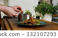 Appetizing Duck Meal Fried Tomato Decorated Close Up Details of Cooking. 132107293