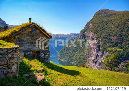 Skagefla Mountain Farm Overlooking Geirangerfjord in Norway Skagefla Mountain Farm Overlooking Geirangerfjord in Norway 132107459