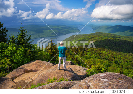 Hiker on Black Mountain Overlooking Lake George, New York State, USA 132107463