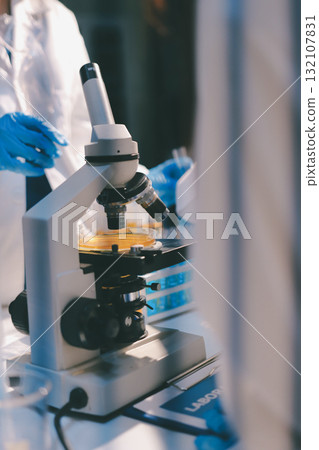 Researchers working in the clinical laboratory Researchers working in the clinical laboratory 132107831