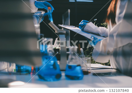 Researchers working in the clinical laboratory Researchers working in the clinical laboratory 132107840