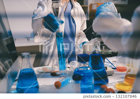 Researchers working in the clinical laboratory 132107846