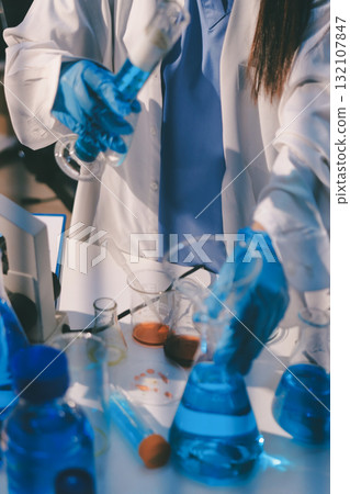 Researchers working in the clinical laboratory Researchers working in the clinical laboratory 132107847