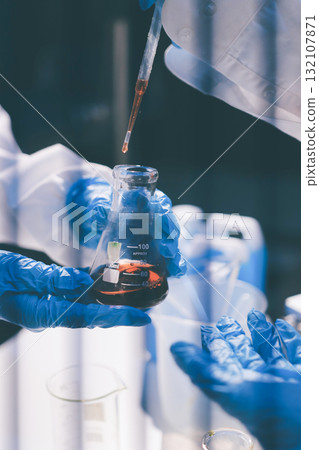 Researchers working in the clinical laboratory 132107871