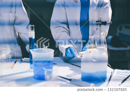 Researchers working in the clinical laboratory 132107885