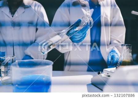 Researchers working in the clinical laboratory 132107886