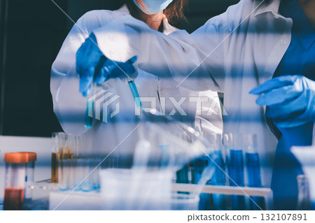 Researchers working in the clinical laboratory Researchers working in the clinical laboratory 132107891