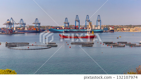 Container port and fish farms in Marsaxlokk, Malta Container port and fish farms in Marsaxlokk, Malta 132107974