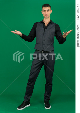 Set of videos with handsome European businessman in classic suit vest and black shirt showing different emotions gestures and confident poses on green chroma key background with copy space Set of videos with handsome European businessman in classic suit vest and black shirt showing different emotions gestures and confident poses on green chroma key background with copy space 132108232