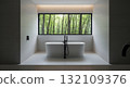 Modern Freestanding Tub In Minimalist Bathroom With Forest View 132109376