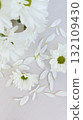 white flowers on a linen fabric background 132109430