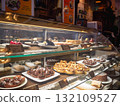 [Ukraine] A wide variety of sweets lined up in a glass case at a cafe in Lviv, western Ukraine 132109527