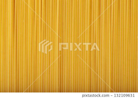 Yellow Spaghetti Texture Made from Durum Wheat Close-Up View 132109631