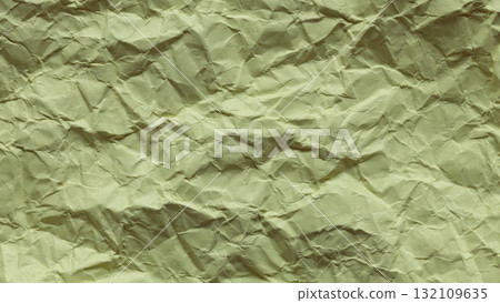 Crumpled Green Paper Texture with Wrinkled Surface Close-Up 132109635