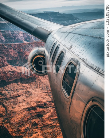 Aircraft Wing And Engine Flying Above Canyon Landscape Showing Aerial Perspective 132109780