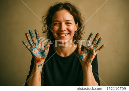 Happy Woman Artist Showing Colorful Painted Hands Happy Woman Artist Showing Colorful Painted Hands 132110709