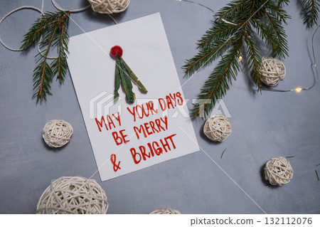 Storytelling of creating craft Christmas greeting card holiday present. Tactile hand-on activity. Master class progress of creative me-made gifts. Seasonal domestic life micro moment hobby.  132112076