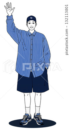 A man in a striped shirt and shorts A man in a striped shirt and shorts 132113801