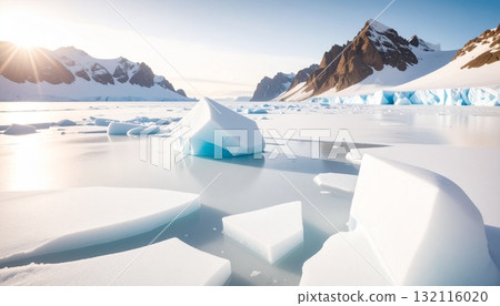 A world of ice reflected in a frozen lake / A mysterious glacier landscape shining in the morning sun 132116020