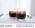 Iced coffee and houseplants on a windowsill (white background) 132116121