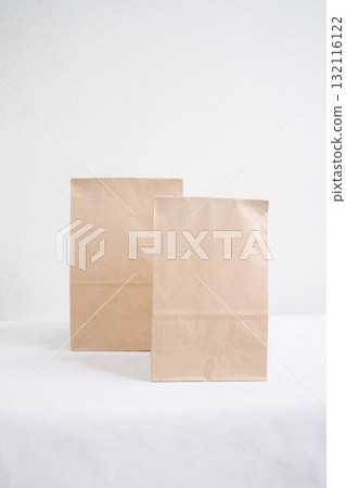 Takeout paper bag (copy space, white background) Takeout paper bag (copy space, white background) 132116122